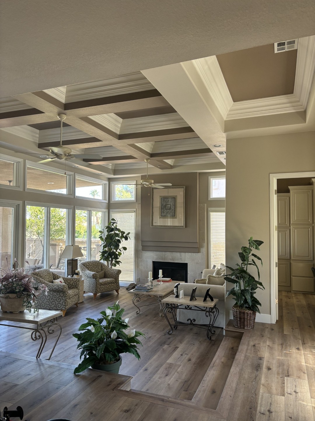 Living room after MSWT remodel — gray tones and wood floors
